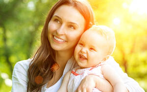 Mother And Baby Love Wallpaper