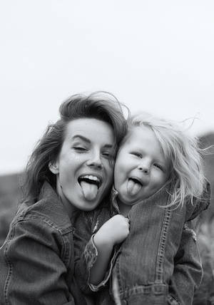 Mother And Daughter Making Silly Faces Wallpaper