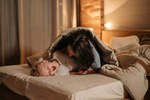 Mother Child Bedtime Laughter.jpg Wallpaper