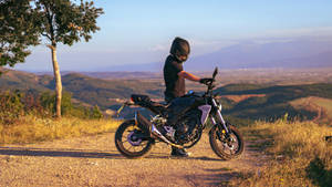 Motorist In Kosovo Mountain Wallpaper