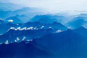 Mountain Ranges Under Blue Sky Wallpaper