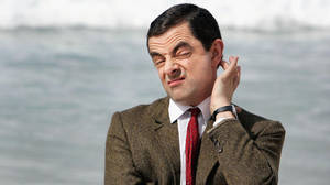 Mr. Bean Scratch Head Pose Wallpaper