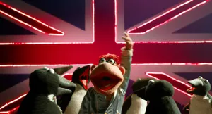 Muppets Most Wanted Movie Scene Featuring Scooter And Penguins. Wallpaper