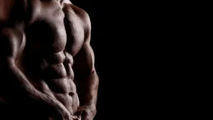 Muscle Man Flexing His Body Wallpaper