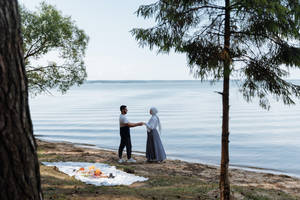 Muslim Couple Picnic Date Wallpaper