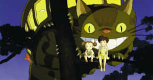 My Neighbor Totoro Movie Scene With Satsuki, Mei, And Totoro Near The Bus Stop Wallpaper