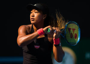 Naomi Osaka Double Handed Grip Wallpaper