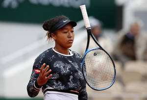 Naomi Osaka Racket Toss Wallpaper