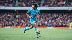 Nathan Ake Running Full Body Wallpaper