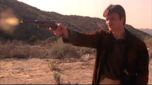 Nathan Fillion Firing Gun Wallpaper