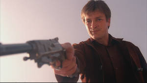 Nathan Fillion Pointing Gun Wallpaper