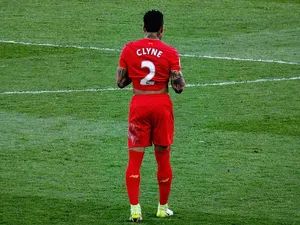 Nathaniel Clyne Red Jersey From Behind Wallpaper