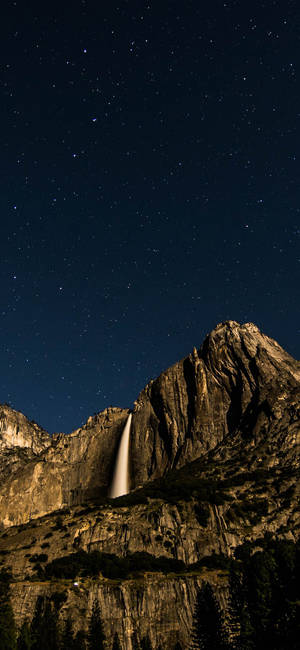 Natural Waterfall From Mountain Night Sky Wallpaper