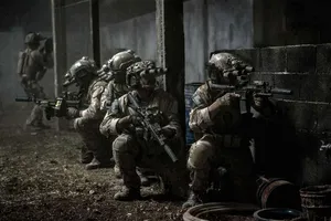 Navy Seal Team Swimmers Emerge From The Sea Wallpaper