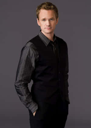 Neil Patrick Harris Posing With A Winsome Smile Wallpaper