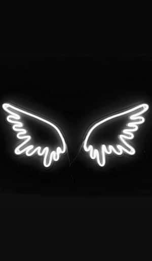 Neon Angel Wings On A Black Background Wallpaper