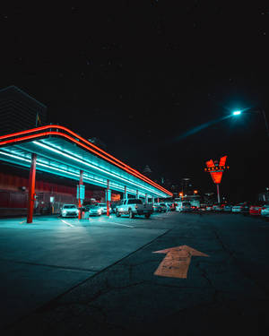 Neon Cars At Gasoline Station Wallpaper