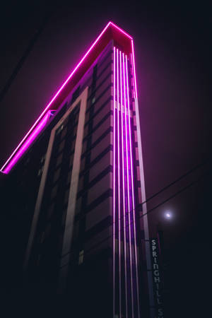 Neon Light Building In Purple Aesthetic Wallpaper