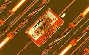Neon Orange Cassette Tape With Wires Wallpaper