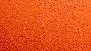 Neon Orange Rough Wall Wallpaper
