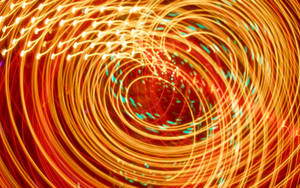 Neon Orange Spiral Lights Wallpaper