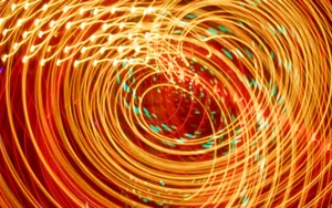 Neon Orange Spiral Lights Wallpaper