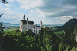 Neuschwanstein Castle Dark Clouds Overhead Wallpaper