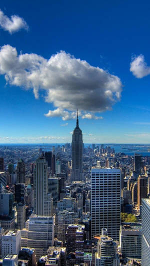 New York City Iphone X Cloud And Buildings Wallpaper