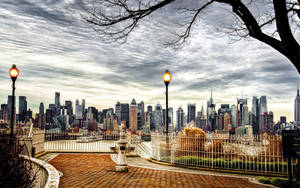 New York Skyline With Gray Clouds Wallpaper