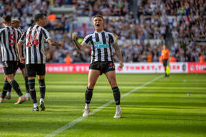 Newcastle United Fc Player Cheering Wallpaper