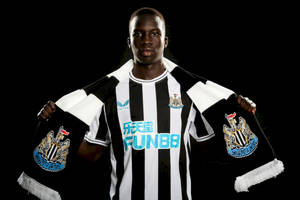 Newcastle United Fc Player Wearing Uniform Wallpaper