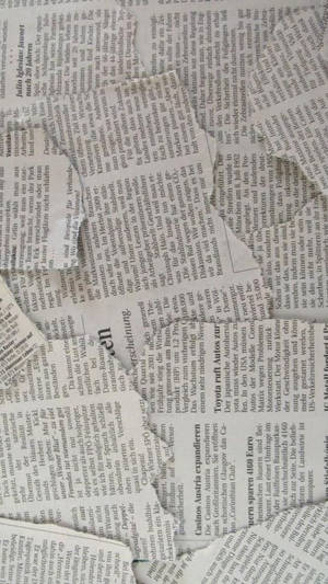 Newspaper Aesthetic Torn Pieces Portrait Wallpaper