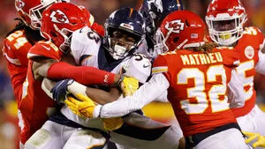 Nfl Players Are Fighting For The Ball Wallpaper