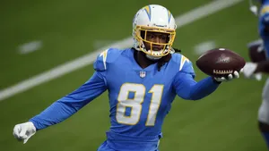 Nfl Pro Wide Receiver Mike Williams In Action Wallpaper