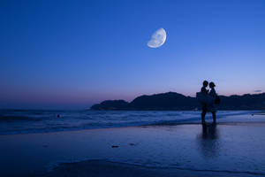 Night Aesthetic Couple On Beach Wallpaper