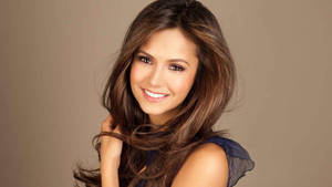 Nina Dobrev In Beige Wallpaper