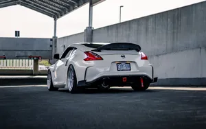 Nissan 370z At A Covered Parking Wallpaper