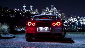 Nissan Gtr Car Heading To The City Wallpaper