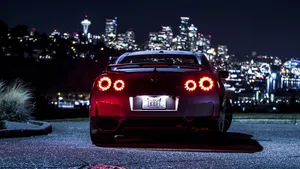 Nissan Gtr Car Heading To The City Wallpaper