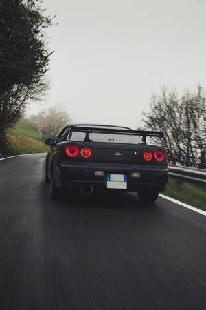 Nissan Skyline Gtr R34 Foggy Road Wallpaper