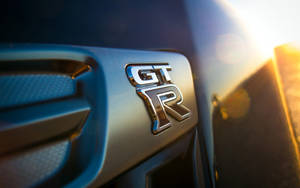 Nissan Skyline Gtr R35 Zoomed-in Logo Wallpaper