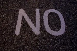 “no” Painted On A Concrete Surface Wallpaper