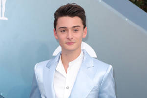 Noah Schnapp In Dusty Blue Outfit For Desktop Wallpaper