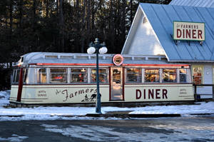 Nostalgic Winter Evening At A 50s Diner Wallpaper