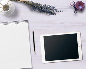 Notepad And Tablet On A Blogger's Workspace Wallpaper