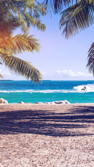 Nothing Beats Enjoying Summer On The Beach With Your Iphone Wallpaper