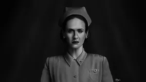 Nurse Mildred Ratched Involved In A Dramatic Scene Wallpaper