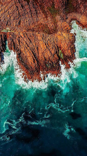 Ocean Waves Crashing Into Shore Iphone Wallpaper