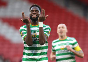 Odsonne Edouard Smiling With Hand Gestures Wallpaper