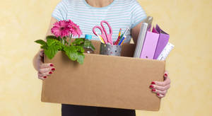 Office_ Relocation_ Items_ Held_by_ Person.jpg Wallpaper